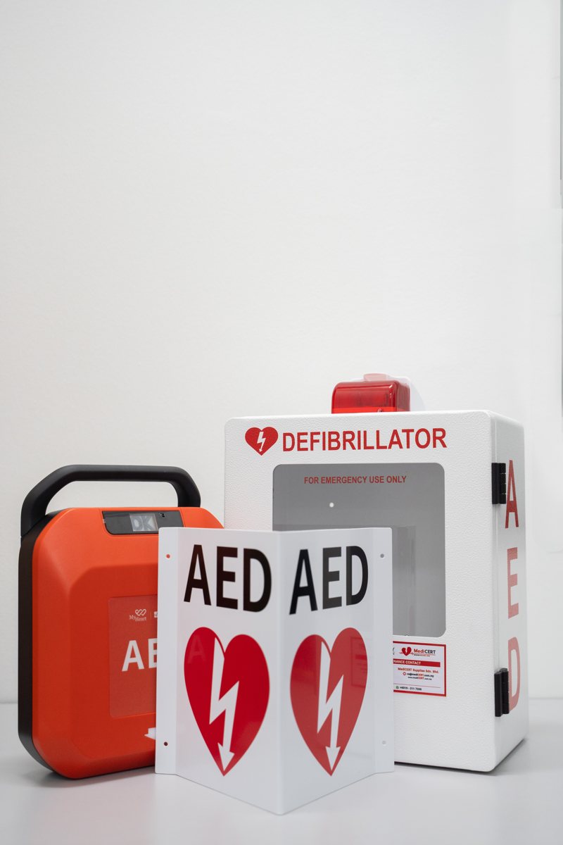 AED package with cabinet and signage