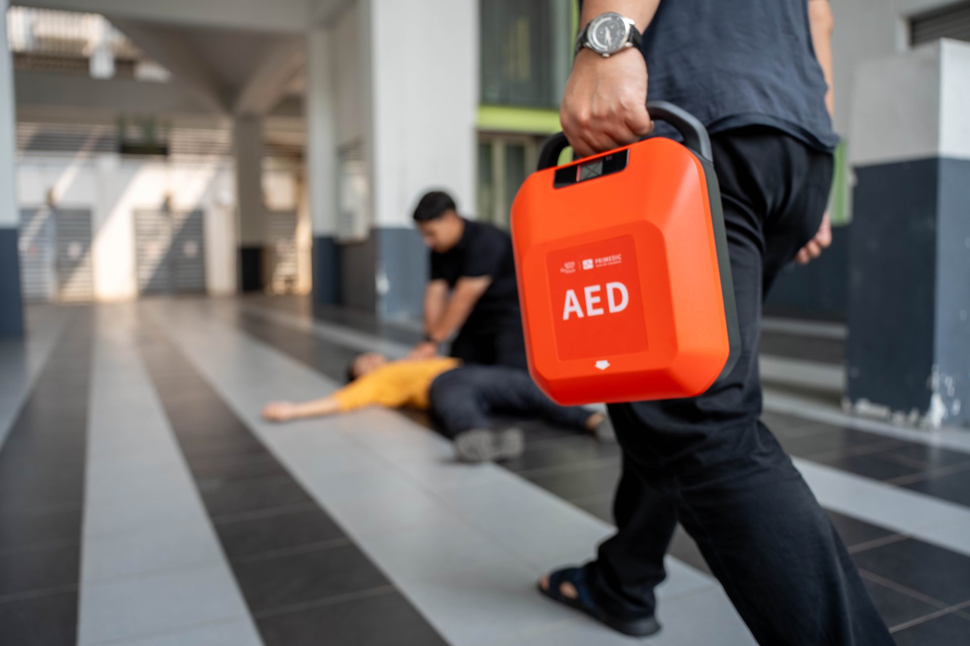 First aiders using an AED during a rescue