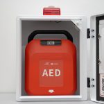 MyHeart Primedic S-Series AED inside an AED cabinet